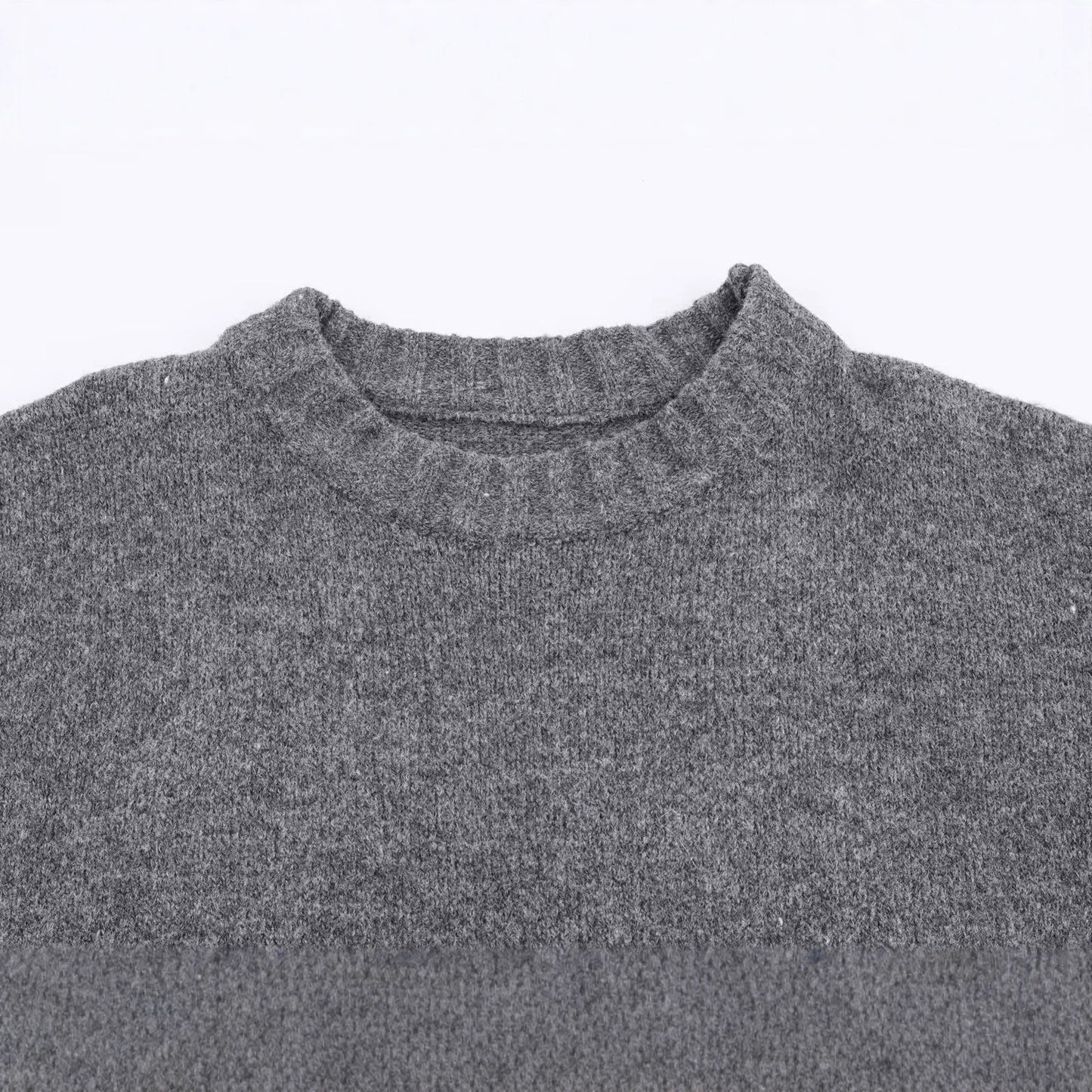 Round neck long sleeved loose fitting pullover knitted sweater for women